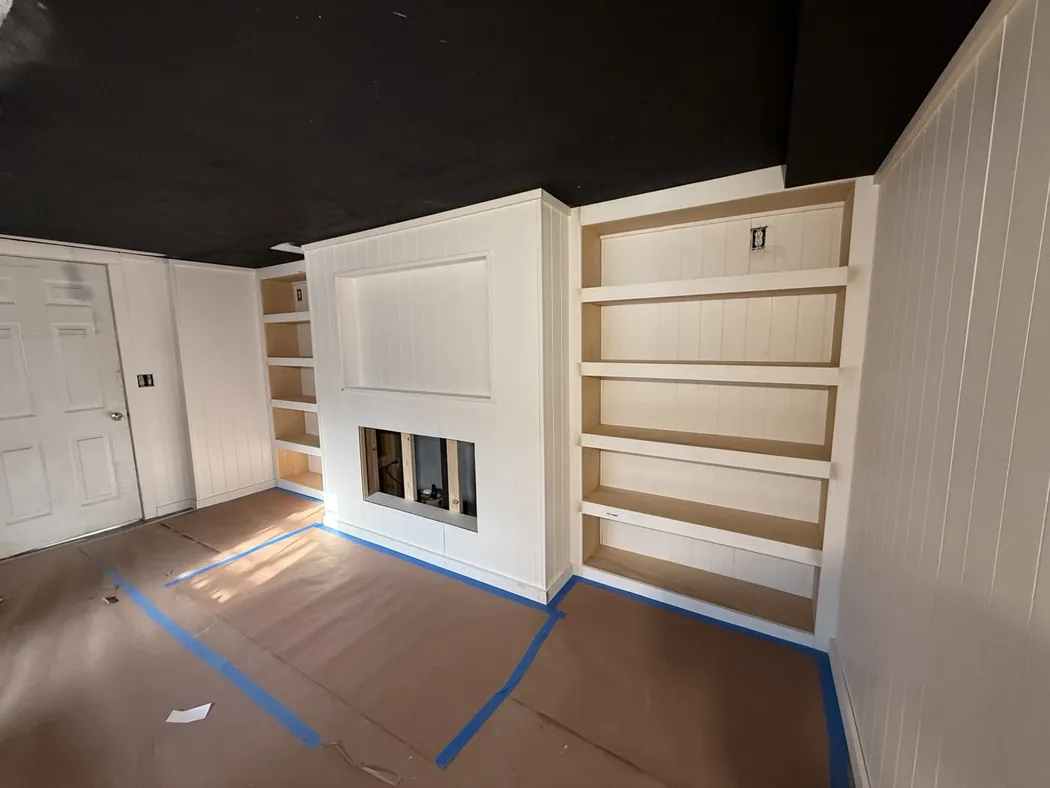 GPF painting preparation with the homeowner's floor carefully covered and taped before interior finish work