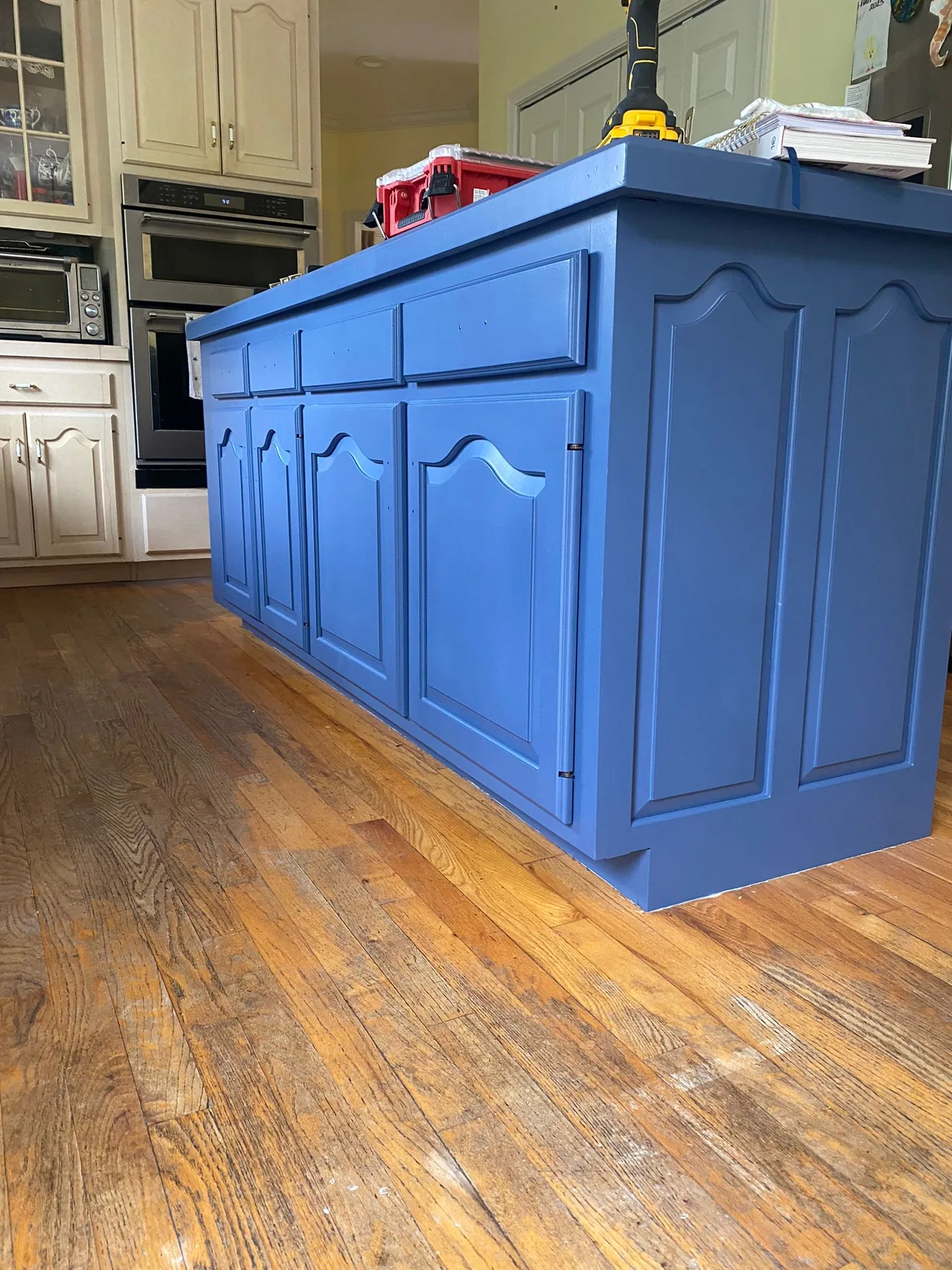 Painted blue kitchen island by GPF Painting Service